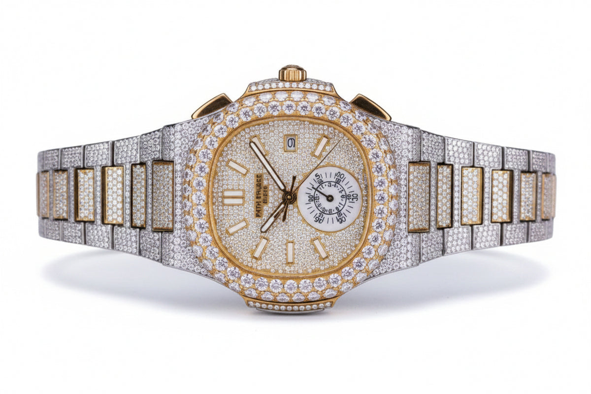 Custom diamond-set two-tone Nautilus with pavé bezel and bracelet
